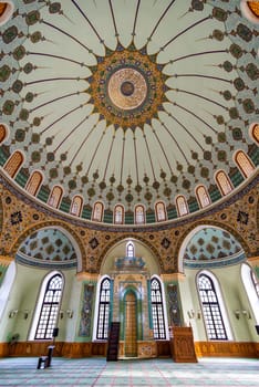 Interior of Taza Pir Mosque in Baku, Azerbaijan, admire its ornate dome and intricate architecture blending traditional Islamic motifs