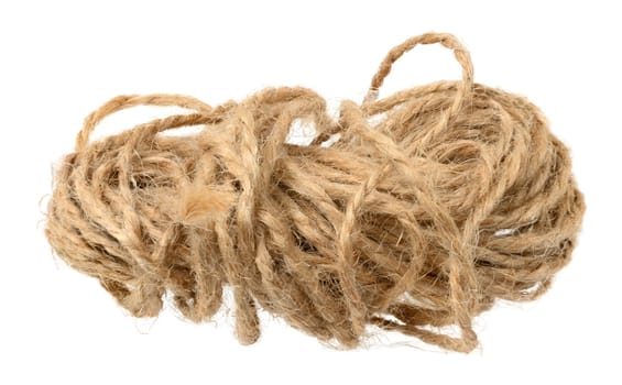 Brown twine rope on a white isolated background, top view. Packing natural