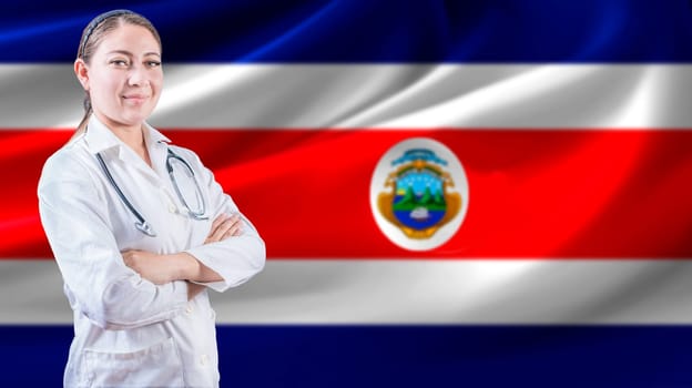 Female doctor with crossed arms with Costa Rican flag in the background. Health care concept with Costa Rica flag in background