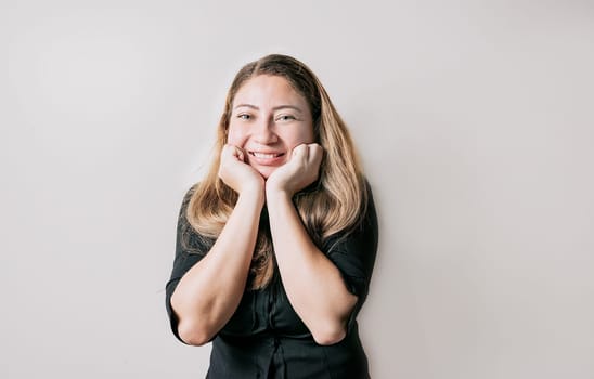 Latin American girl face looking and smiling at the camera. Portrait of friendly latin girl smiling isolated. Young Nicaraguan woman smiling at camera