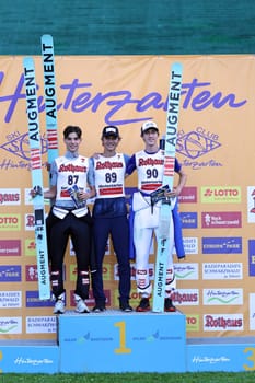 Triple triumph at the opening competition of the FIS Cup in Hinterzarten: v.li. Julijan Smid (SV Achomitz),Hannes Landerer (SV Innsbruck Bergisel/Austria) and Hannes Fussenegger (SV Dornbirn) at the award ceremony after the FIS Cup Summer Ski Jumping Hinterzarten 2024