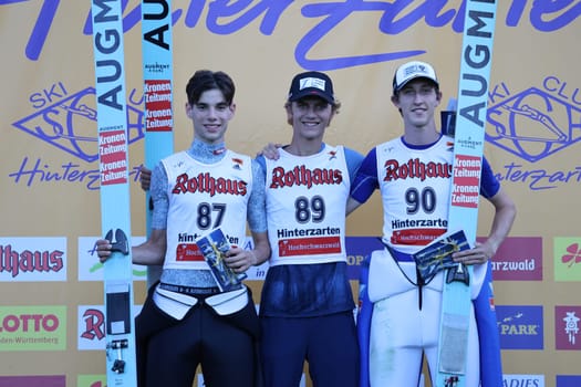 Triple triumph at the opening competition of the FIS Cup in Hinterzarten: v.li. Julijan Smid (SV Achomitz),Hannes Landerer (SV Innsbruck Bergisel/Austria) and Hannes Fussenegger (SV Dornbirn) at the award ceremony after the FIS Cup Summer Ski Jumping Hinterzarten 2024
