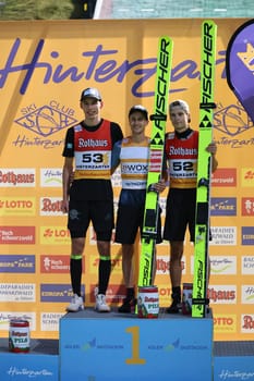 Award ceremony for the COC Cup summer ski jumping Hinterzarten 2024,v.li. Luca Roth (SV Messstetten),Clemens Aigner (SV Innsbruck Bergisel) and Fredrik Villumstad (Norway)