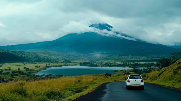 Lonely white car driving by serpentine curved asphalt mountain road.Travel concept.AI generated