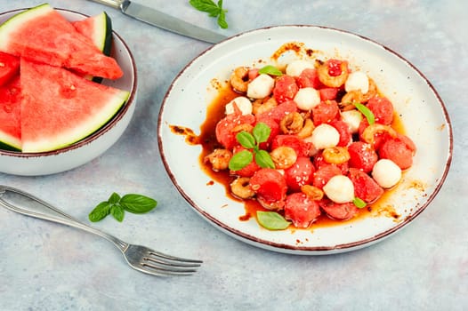 Summer salad with watermelon, mozzarella cheese and shrimp.