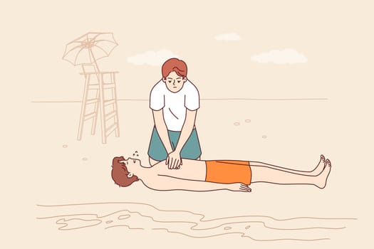 Man indirect lifeguard gives cardiac massage to drowned guy, providing first aid until 911 arrives. Work of rescue male demonstrating skills of resuscitation and restoring heartbeat of drowned man
