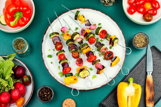 Grilled vegetable kebabs, skewers with vegetables. Diet barbecue.
