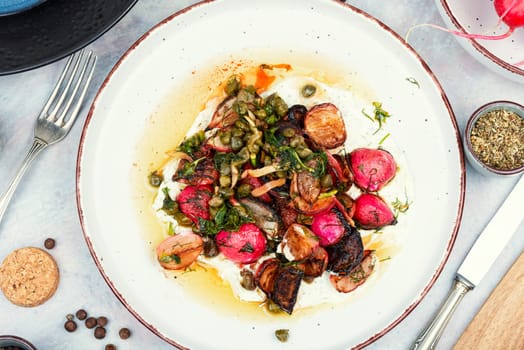 Roasted radish salad or piccata. Radish dishes, vegan recipe.