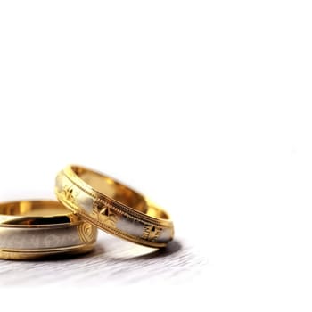 Wedding rings, close-up on a white background .
