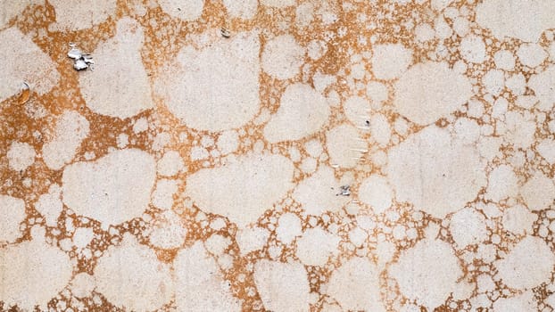 Texture of camouflage armored metal with damage close-up. Armor deformation from a shell close-up. Damaged armor of a Russian armored personnel carrier by shell fragments. War in Ukraine