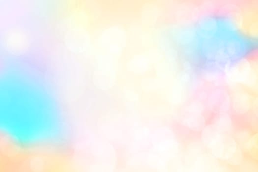 Abstract blurred fresh vivid spring summer light delicate pastel yellow pink orange turquoise bokeh background texture with bright circular soft color lights. Beautiful backdrop illustration.