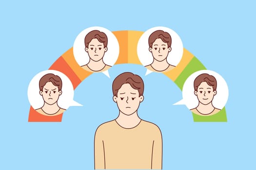 Young man with impostor syndrome feels drop in mood when standing near emotion scale.