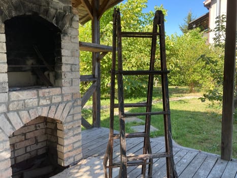 A stepladder stands on a the veranda