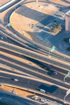 Top view of highway interchange in Dubai, UAE. Morning shot