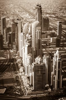 Dubai downtown morning scene. Top view from above. Sepia toned shot