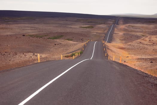 Endless Highway through Icelandic landscape. Filtered shot