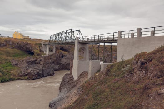 Bridge on The Skjalfandafljot river in Iceland. Overcast Gloomy Weather