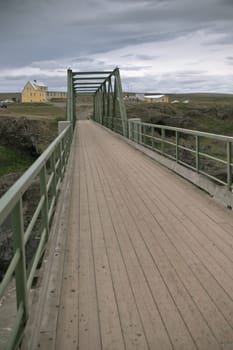 Bridge on The Skjalfandafljot river in Iceland. Overcast Gloomy Weather