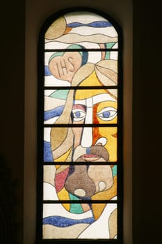 The mystery of the Heart of Jesus, stained glass window in parish church Assumption of the Virgin Mary in Pregrada, Croatia