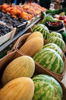 Assortment of fresh fruits and vegetables at market