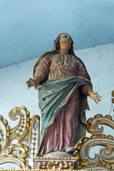 Virgin Mary under the cross, statue on the main altar in Saint Catherine of Alexandria Church in Krapina, Croatia