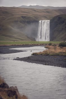 Skogafoss Waterfall, southern part of Iceland, at overcast weather