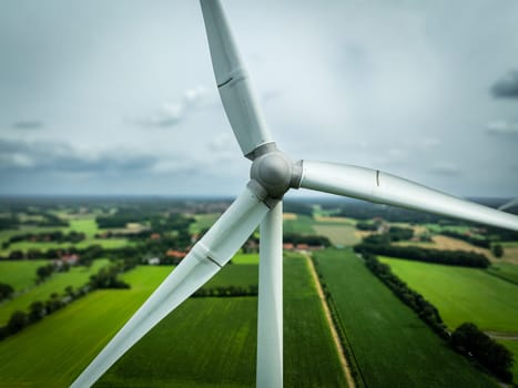 aerial view of some wind turbines in a rural landscape