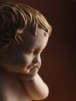 Close up of a Christmas angel against a red background, Christmas or holiday background