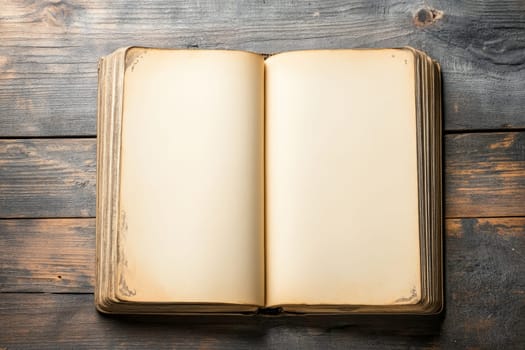 An old, worn book with yellowed pages open on a rustic wooden plank surface, evoking nostalgia and history.