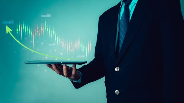 Stock market, Business growth, progress or success concept. Businessman or trader is showing a growing virtual hologram stock, invest in trading.