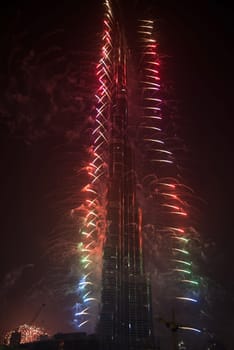 DUBAI, UAE - JANUARY 01: New Year Celebrations Fireworks at Burj Khalifa world's tallest tower at Dubai Downtown on January 01, 2015 in Dubai, United Arab Emirates