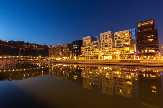 FRANCE, LYON - FEBRUARY 19: The Confluence District in Lyon, France on February 19, 2013. New district with an modern architecture in the place of the old port. Night shot