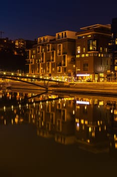 FRANCE, LYON - FEBRUARY 19: The Confluence District in Lyon, France on February 19, 2013. New district with an modern architecture in the place of the old port. Night shot