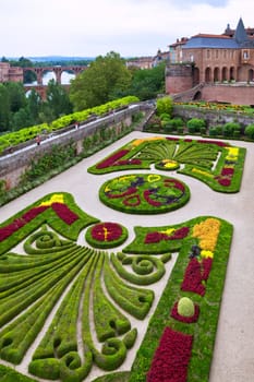 ALBI, FRANCE - AUGUST 09: Palais de la Berbie Gardens at Albi, Tarn, France on August 09, 2014. Beautiful flowerbed