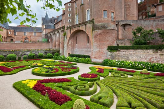 ALBI, FRANCE - AUGUST 09: Palais de la Berbie Gardens at Albi, Tarn, France on August 09, 2014. Beautiful flowerbed