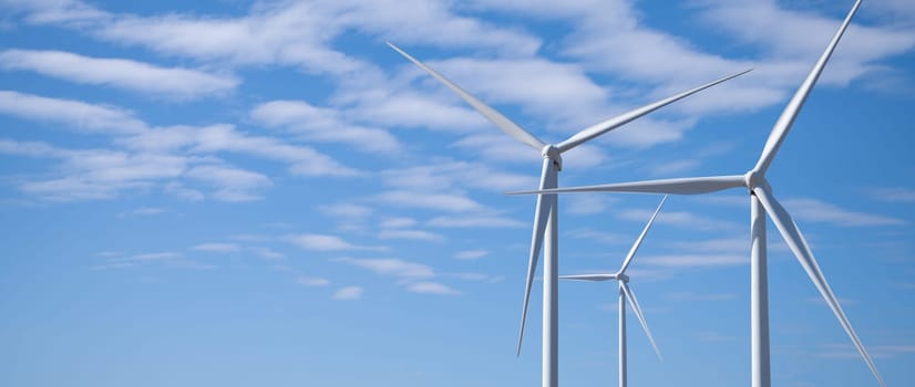 Wind energy and sustainable power generation with wind turbines, Eco-friendly solutions for renewable resources. Wind power farm and sustainable development of renewable energy, green technology.