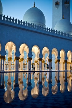 Beautiful gallery of famous Sheikh Zayed White Mosque in Abu Dhabi, UAE at night