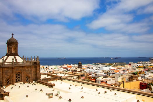Gran Canaria, Spain, Canary Islands, Las Palmas - Jul 22, 2024. The dome of Cathedral of Santa Ana at left site and in the middle the church of St. Augustine.