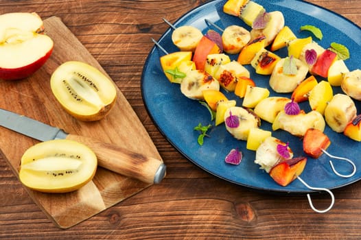 Fresh fruit dessert- fruits on stick.