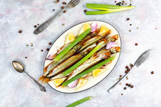 Plate with delicious smoked capelin