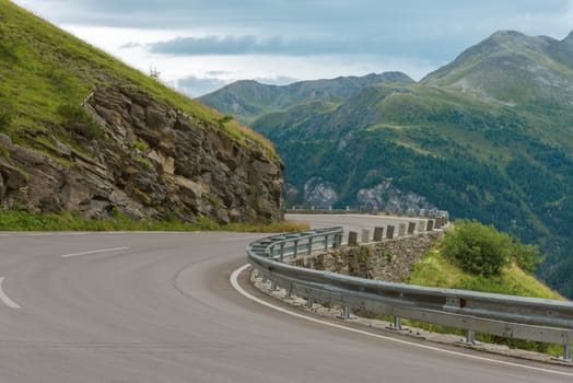 Road Turn in Swiss Mountains. Small GRIP toned image