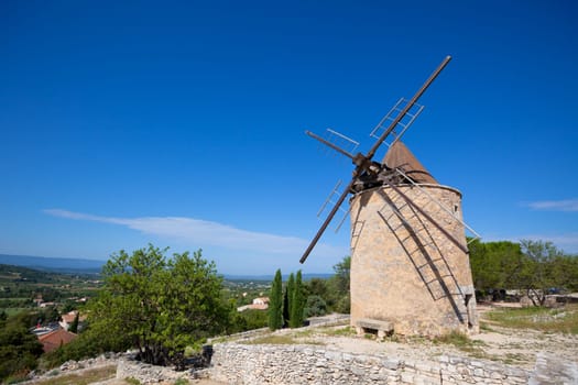 Old stone windmill in Saint Saturnin les Apt, Provence, France
