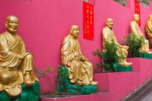 Golden statues in The ten thousand buddhas monastery in Hong Kong