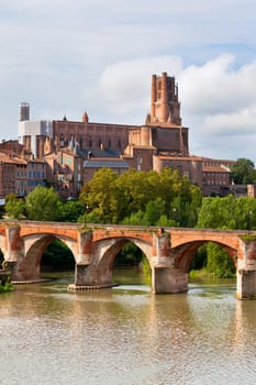 View of the August bridge and The Saint Cecile church in Albi, France. Vertical shot