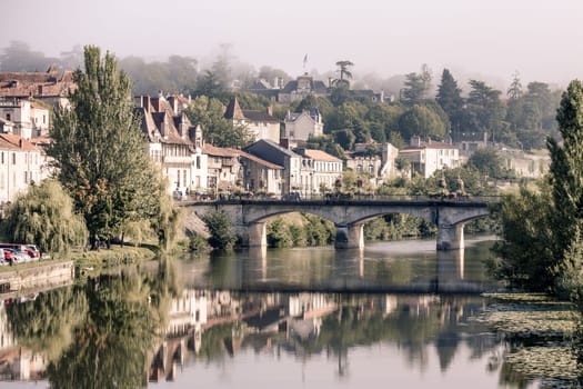 Picturesque view of Perigord town in France. Landscape with the river Vezere.