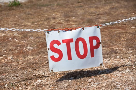 Stop sign restricting entry. Horizontal shot