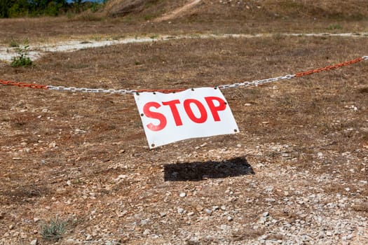 Stop sign restricting entry. Horizontal shot