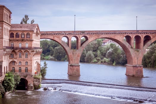 Cityscape with an old bridge in Albi, France. Horizontal filtered shot