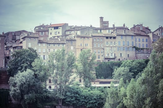 Cityscape with old houses in Albi, France. Horizontal filtered shot