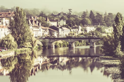 Picturesque view of Perigord town in France. Landscape with the river Vezere.